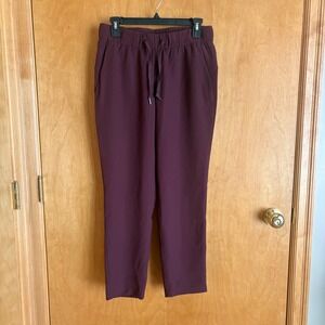 Lululemon On the Fly 7/8 Pant Womens 6‎ Burgundy Plum  Drawstring Jogger